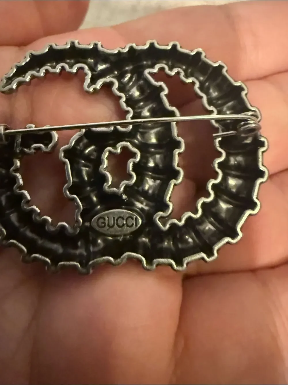New with box Gucci gun metal color gg brooch